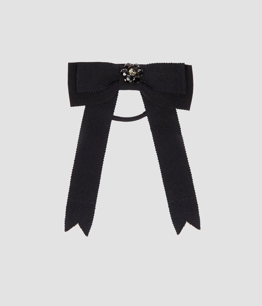 Bow hair tie from designer ERDEM. Black bow hair tie made from luxury grosgrain with a crystal flower in the centre, it's the perfect addition to an outfit. 