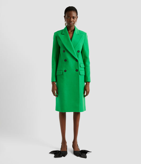 Fitted double breasted coat with a classic boxy fit silhouette. The bright green double breasted coat is made from wool and cashmere with flap pockets and a structured shoulder.