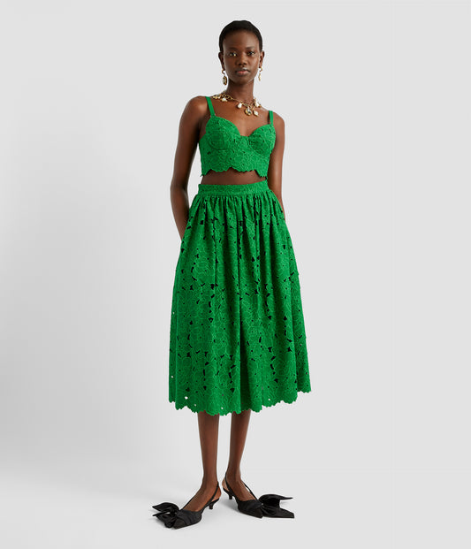 Green flared skirt in floral cutwork fabric by designer ERDEM. Pockets give the green volume skirt a relaxed feel with a fitted waist and large skirt. 