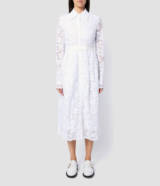 The Corinne dress  by designer ERDEM is a long sleeve lace shirt dress with a collar and nipped in waist. In white ivory lace, it's the perfect option for a relaxed wedding or reception dress. 