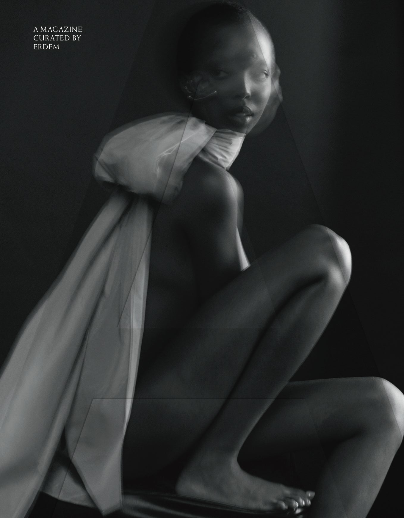 A minimalist magazine cover in black and white with a model and words "A magazine curated by ERDEM". The magazine contains a range of sociological and aesthetic references.