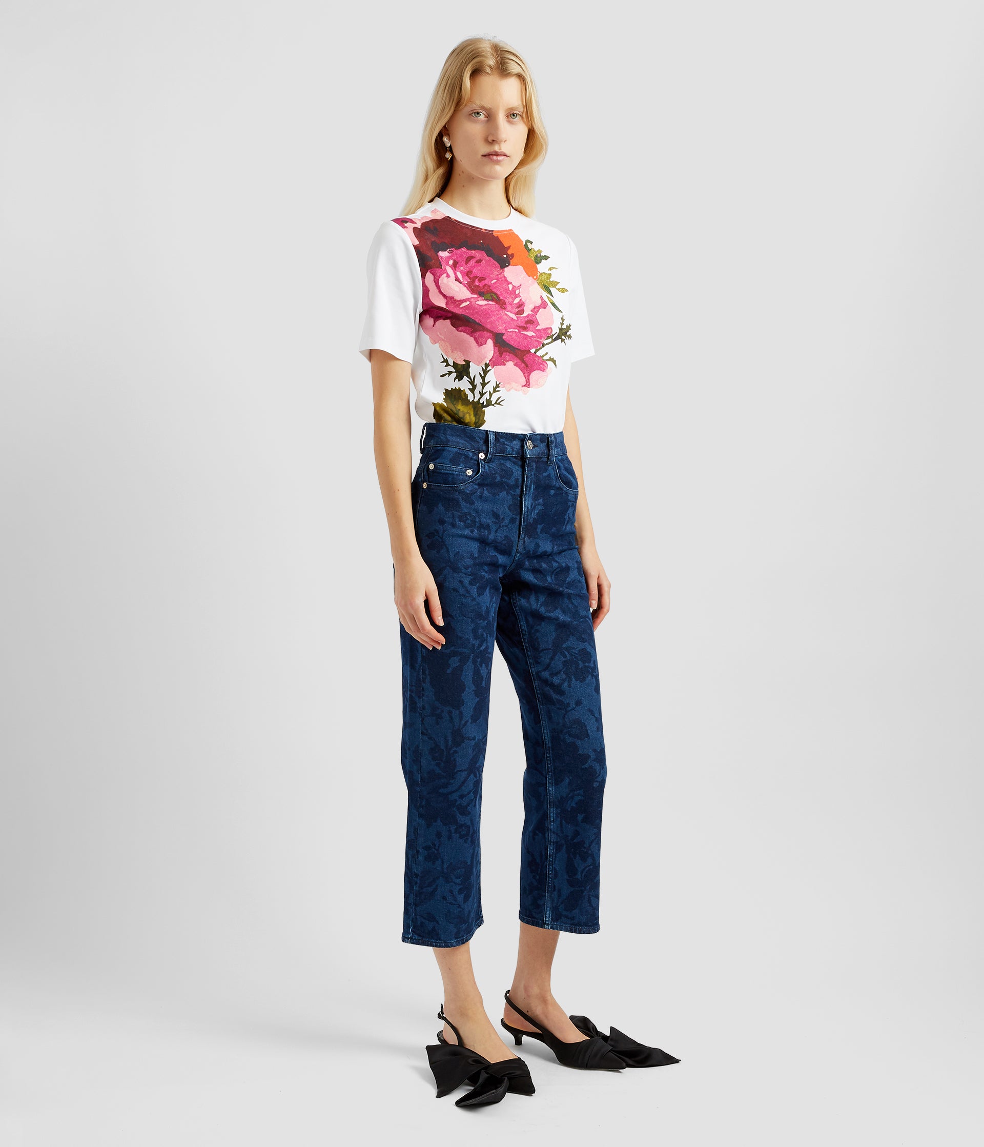Straight leg floral print jeans. A feminine twist on the classic, these straight leg jeans feature a bold but subtle floral print. Worn here with a t-shirt. 