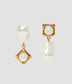 Pearl and stone earrings by designer ERDEM. These gold-tone earrings feature a drop pearl and gold set stone, with each earring being the opposite of the other. Classic but fun, they will elevate any outfit. 