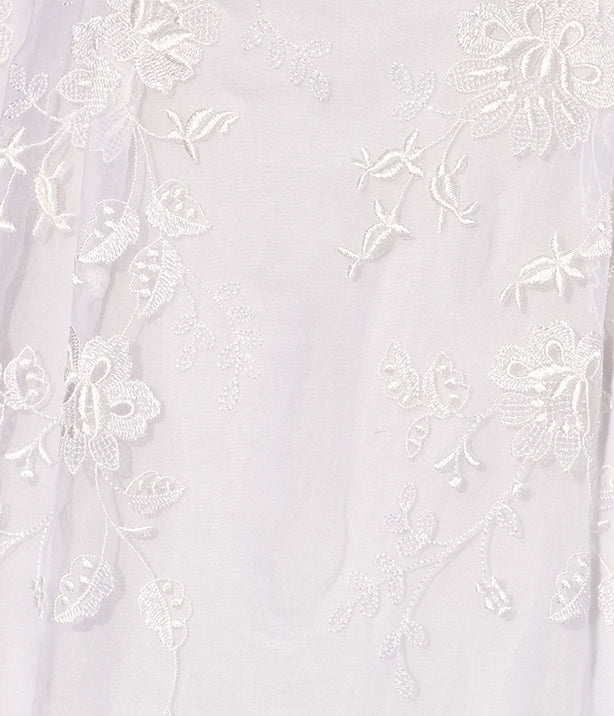 sheer sleeves and a mid-length ruffled hem.
