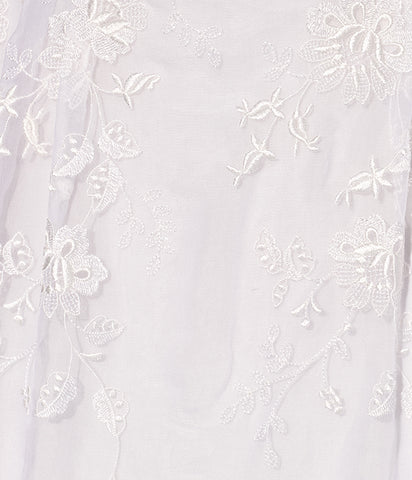 sheer sleeves and a mid-length ruffled hem.