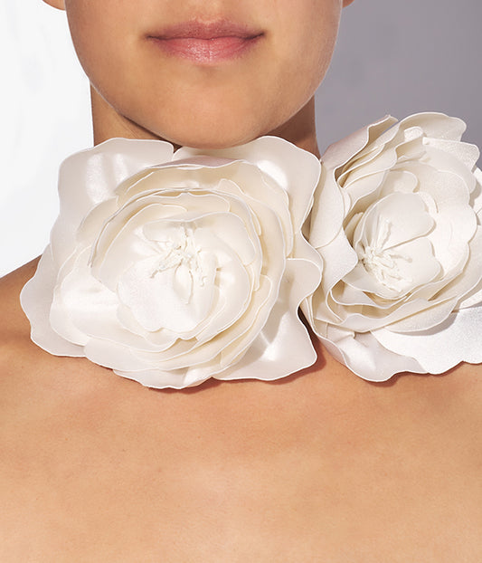 Complete a romantic bridal look with this oversized flower necklace from Erdem in ivory satin.
